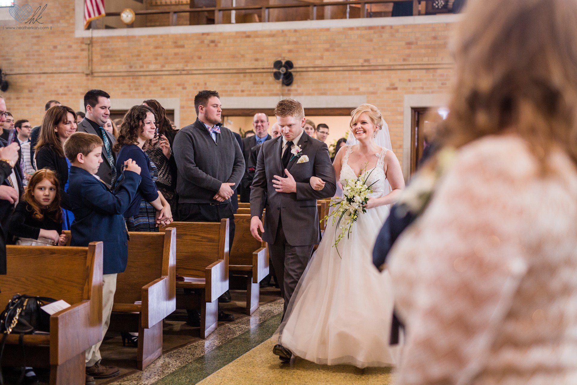 wedding photographs at Church of the Resurrection in Lansing Michigan , bride's entrance