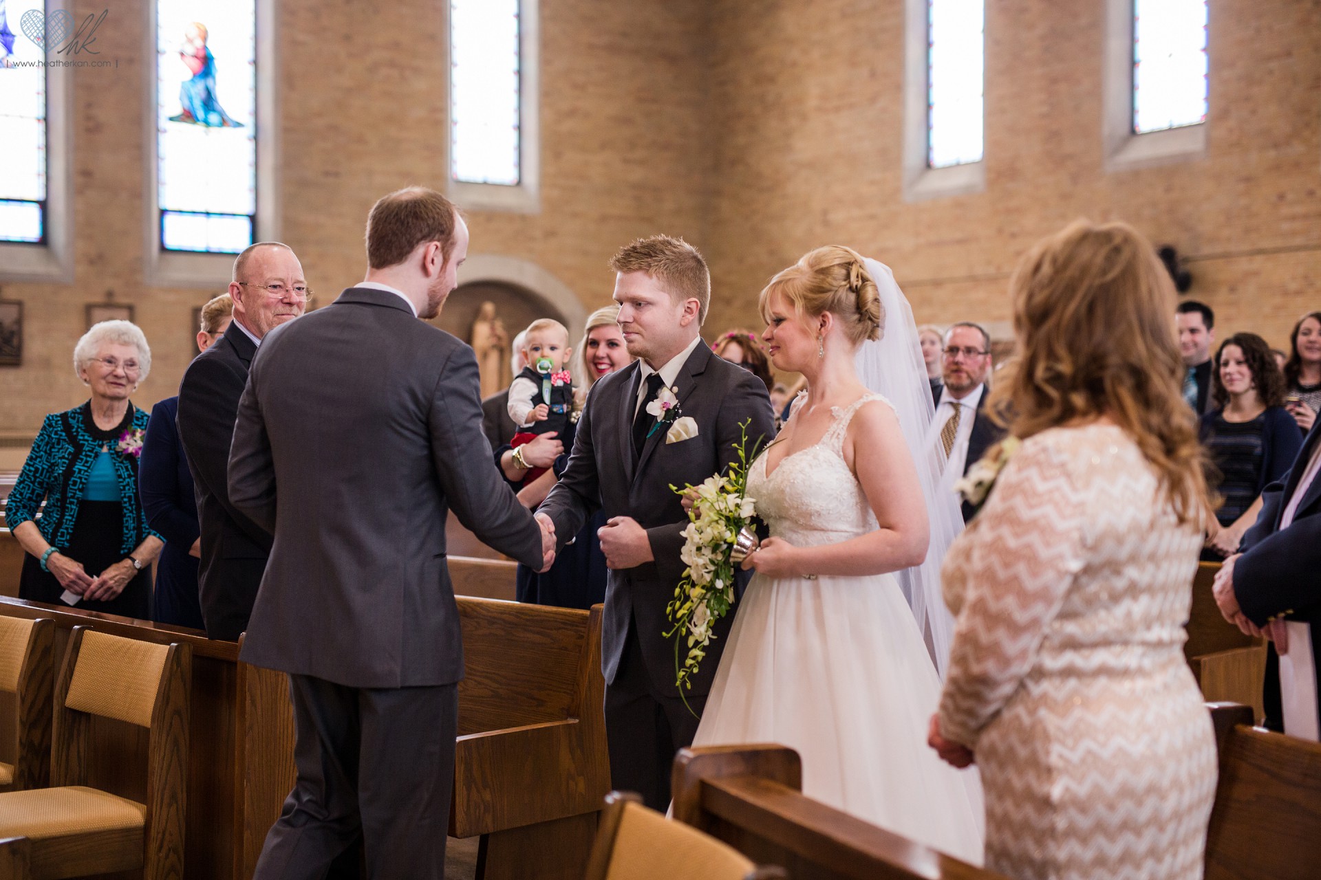 wedding photographs at Church of the Resurrection in Lansing Michigan , bride's entrance