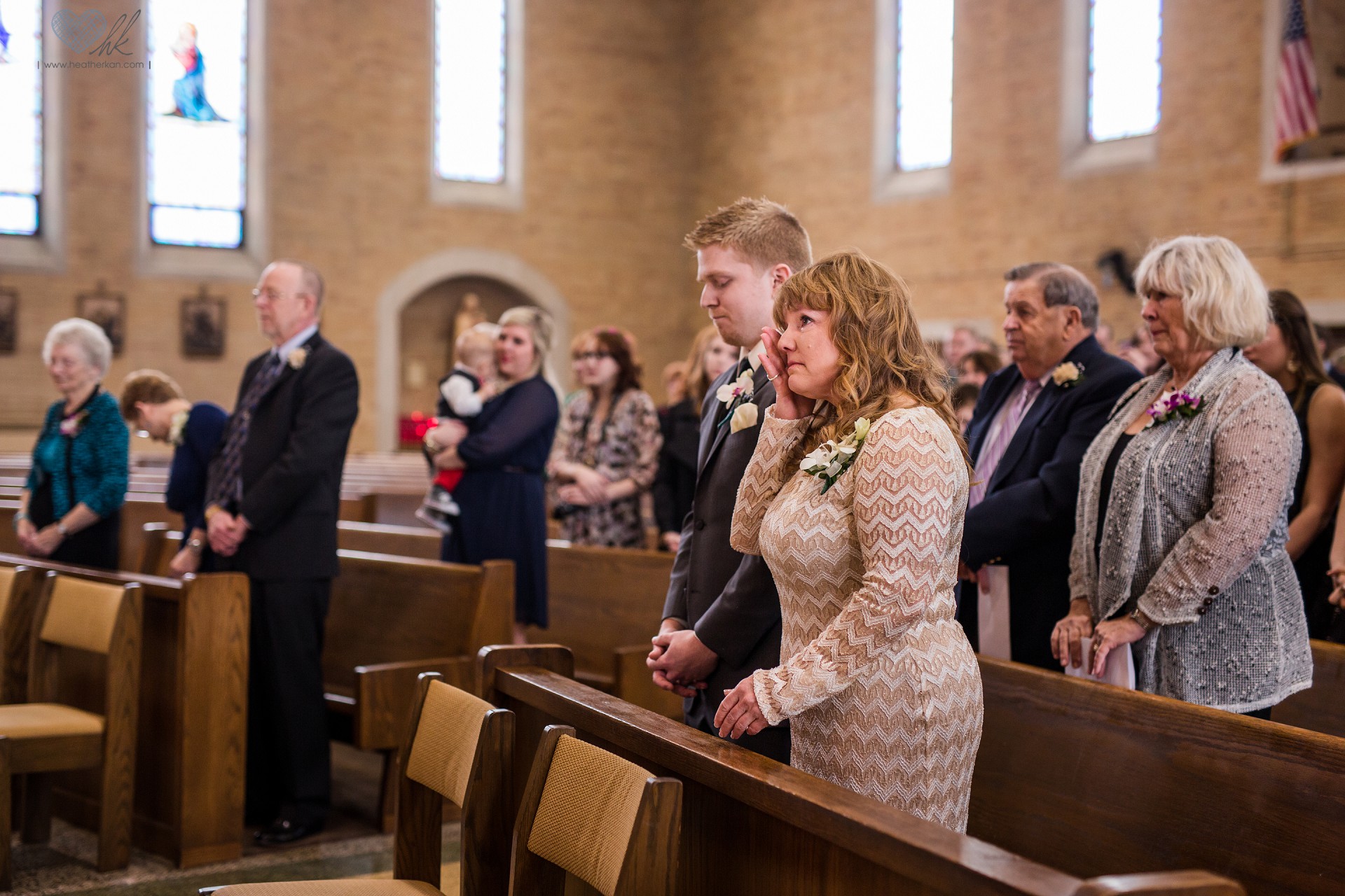 wedding photographs at Church of the Resurrection in Lansing MI, mother crying