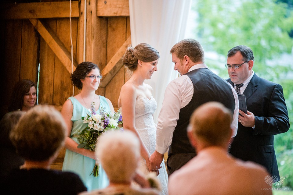 indoor barn ceremony wedding photographs at Milestone Barn Bannister, MI