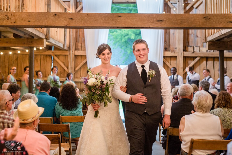 indoor barn ceremony wedding photographs at Milestone Barn Bannister, MI