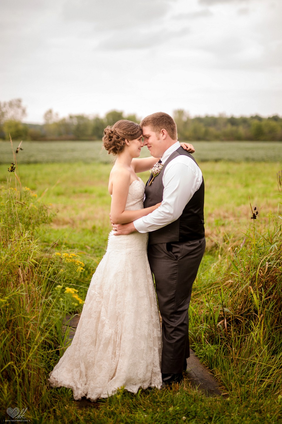relaxed country wedding photographs at Milestone Barn Bannister, MI