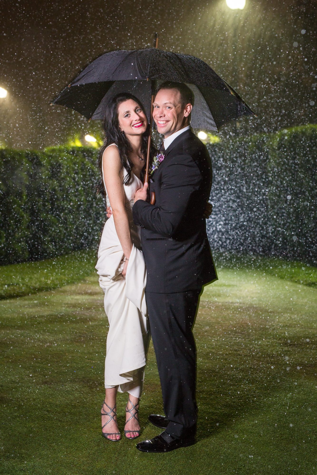 Royal Park Hotel wedding portraits in the rain at night