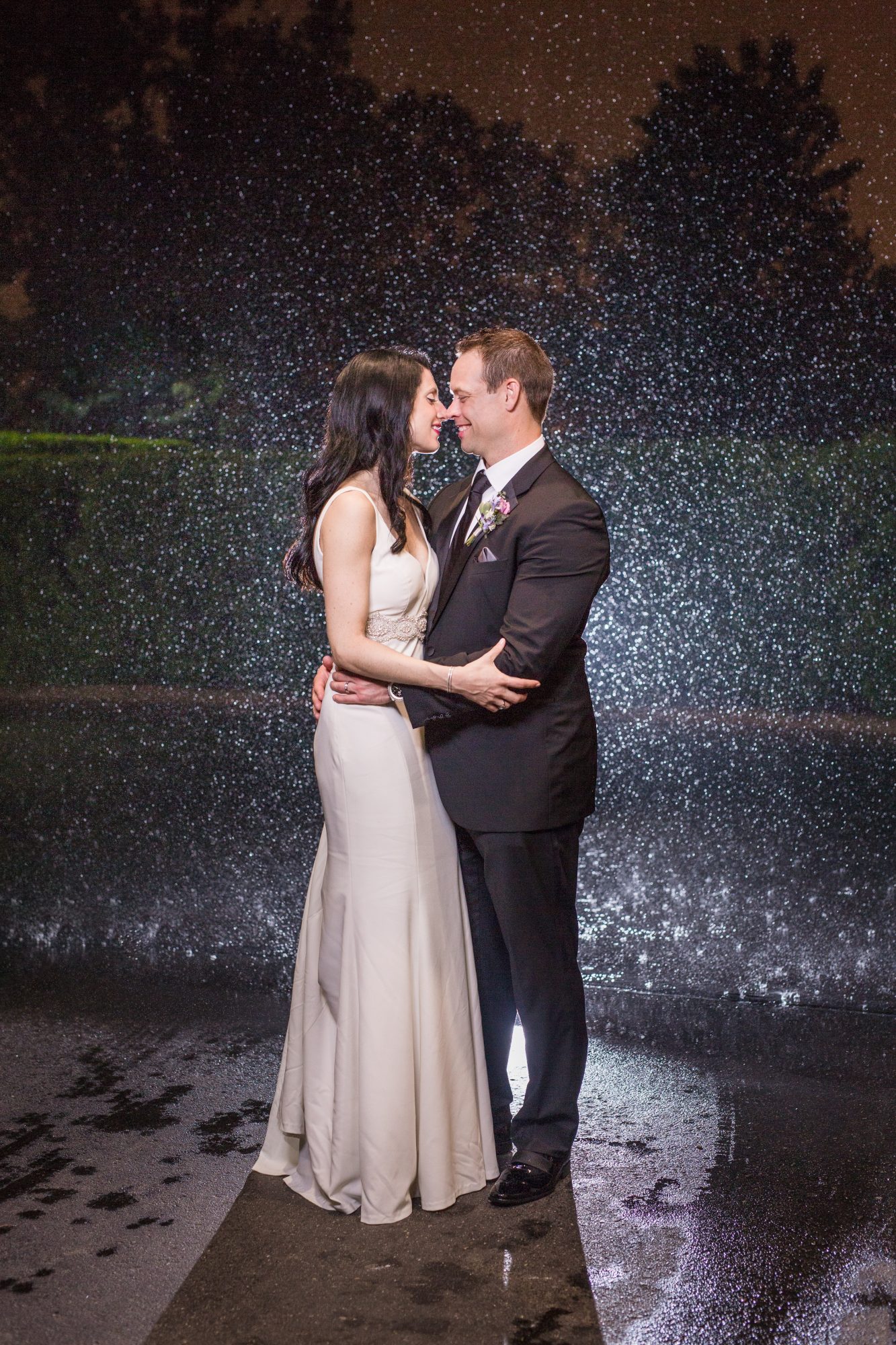 Royal Park Hotel wedding portraits in the rain at night