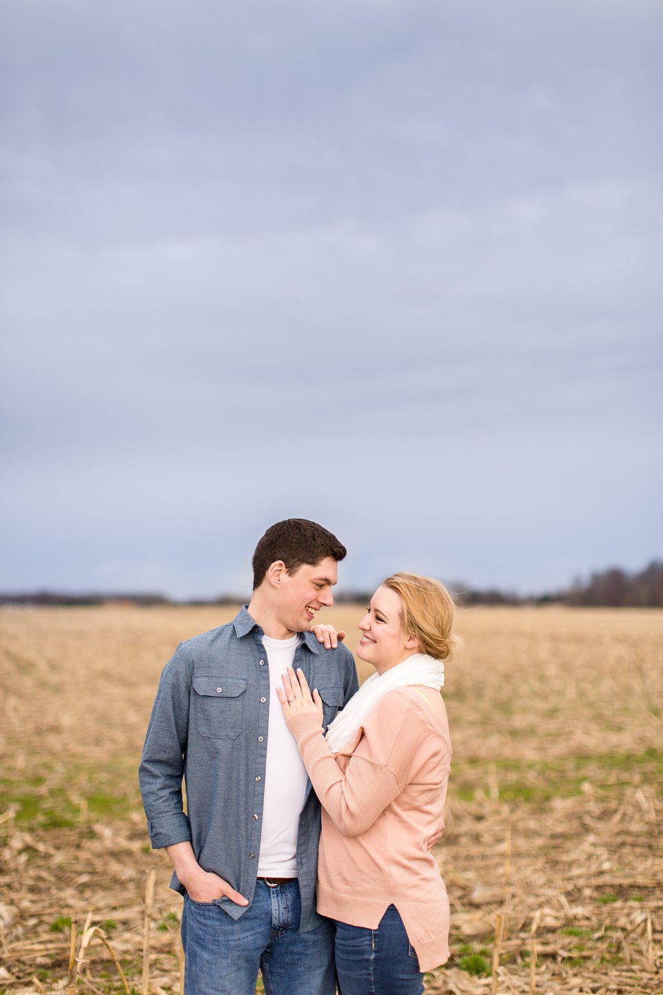 Spring engagement photographs in cornfield Michigan