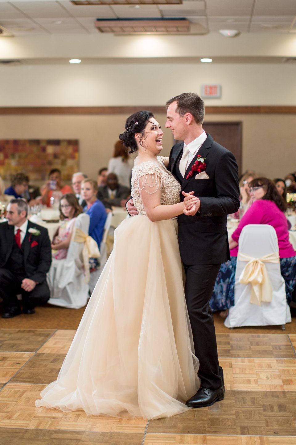 Okemos Conference Center wedding reception photographs on the dancefloor