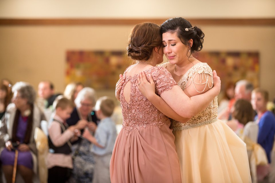 Okemos Conference Center wedding reception photographs on the dancefloor