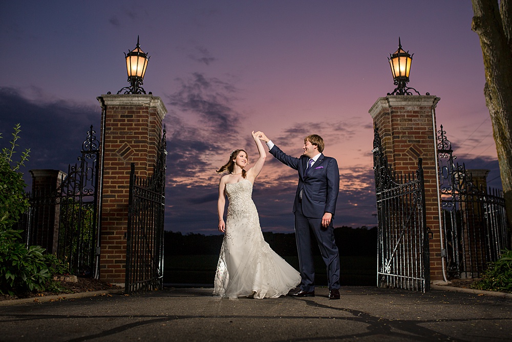 Sunset wedding photographs at the English Inn gate, Eaton Rapids