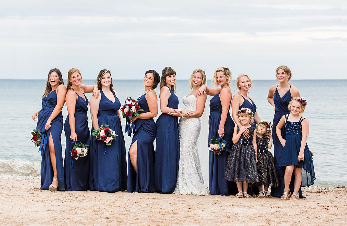 Destination wedding photographs in Mackinaw City, Michigan at the beach