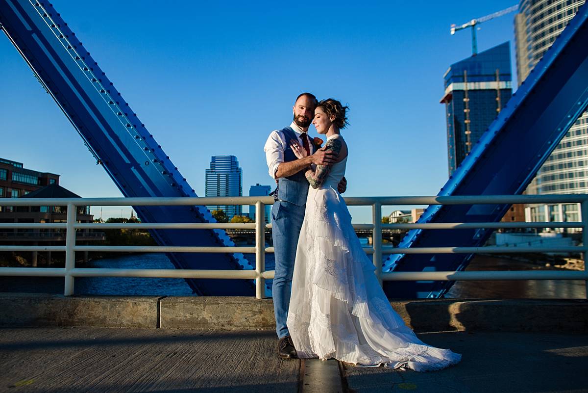 Wedding photographs at sunset on the Blue Bridge in Grand Rapids Michigan