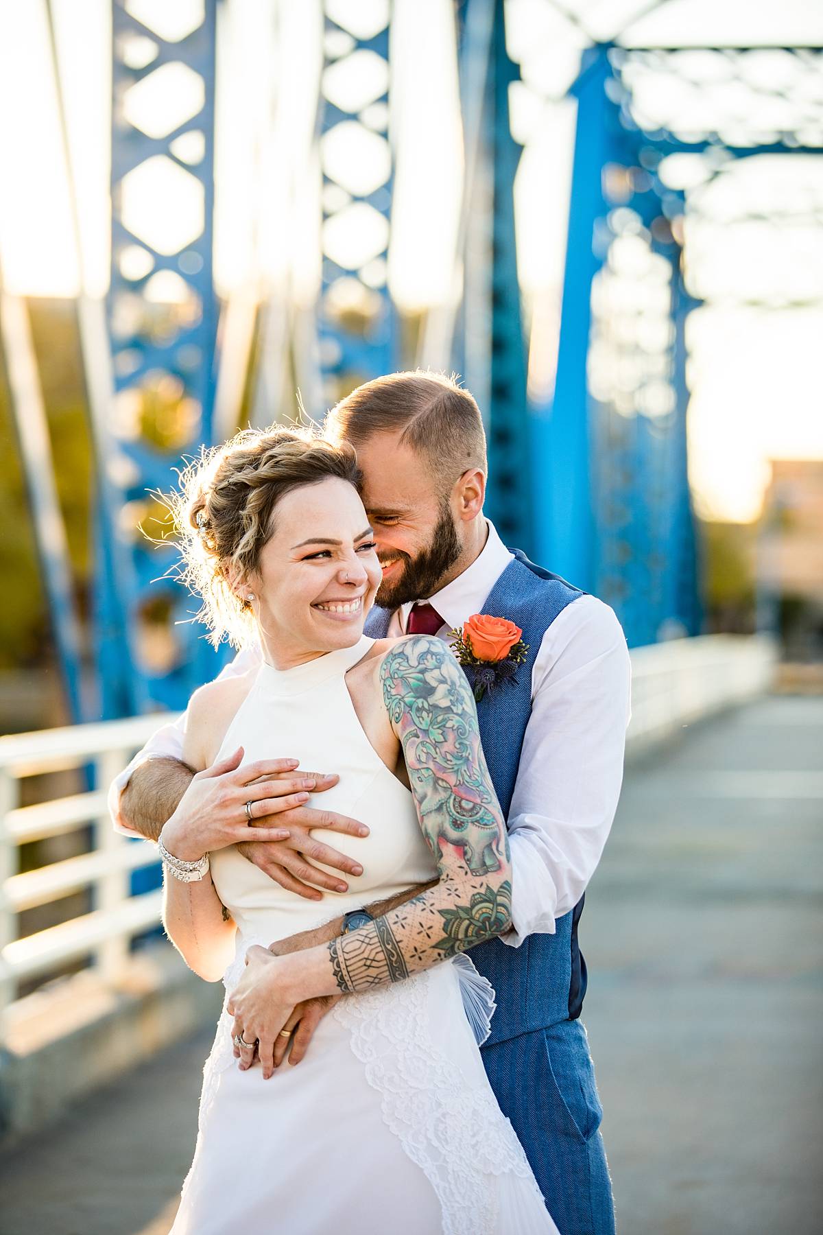 Wedding photographs at sunset on the Blue Bridge in Grand Rapids Michigan