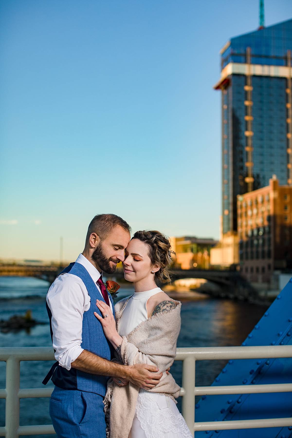 Wedding photographs at sunset on the Blue Bridge in Grand Rapids Michigan