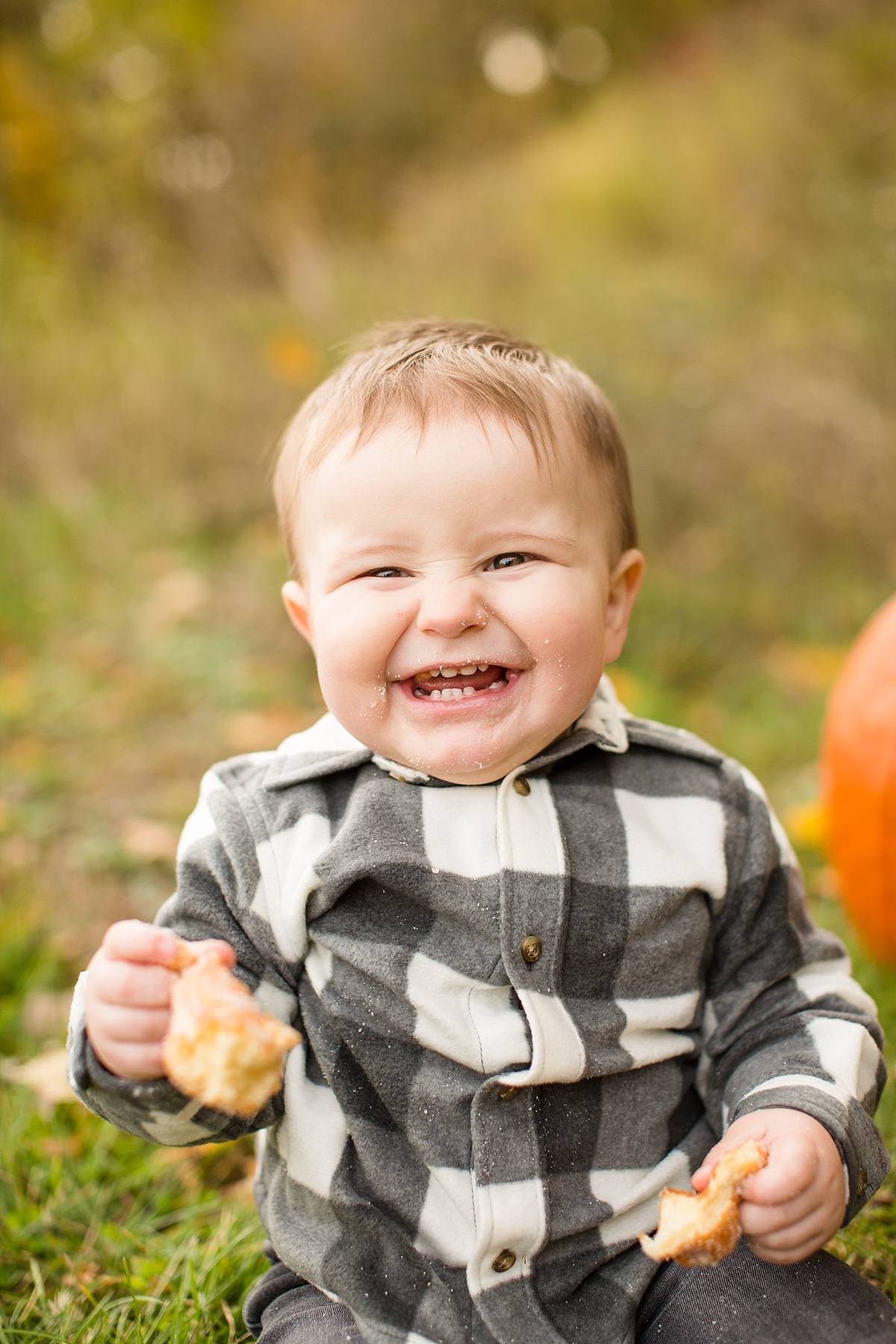 Fall family photographs with cider mill doughnuts at Lincoln Brick Park in Grand Ledge, Michigan