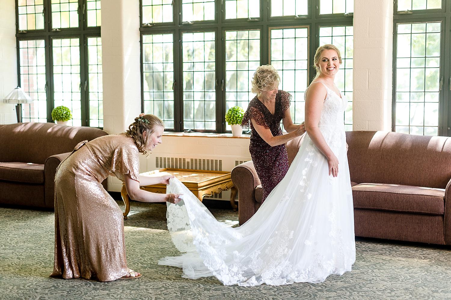 Bride getting ready in the basement of the MSU Alumni Chapel