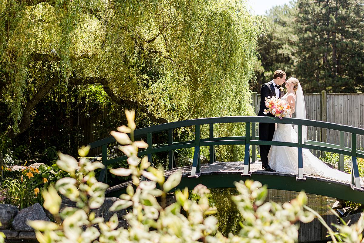Michigan State University Wedding photographs at 4H Horticulture Gardens on bridge