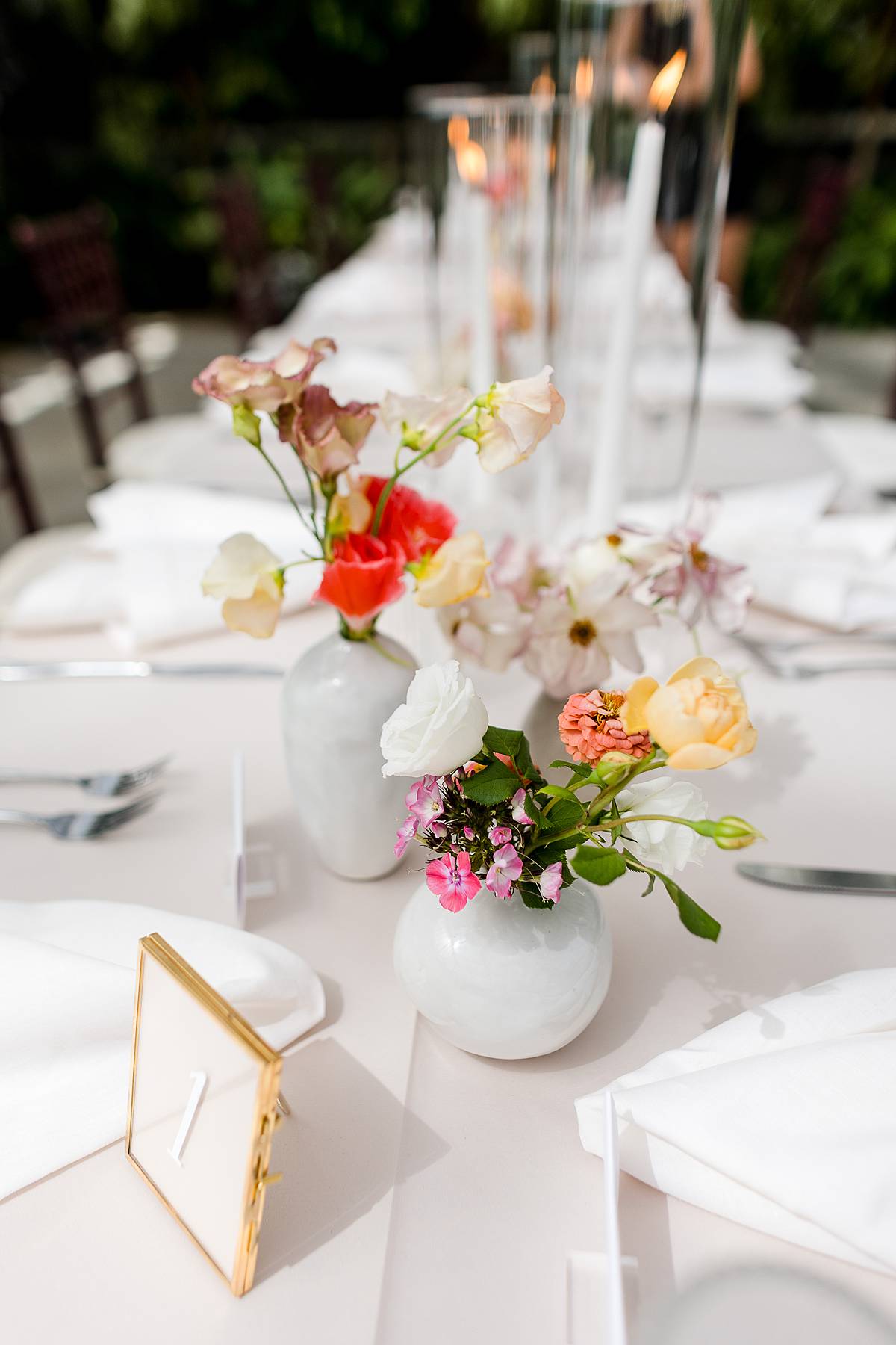 MSU wedding with incredible floral decor in the Michigan State University Horticulture Garden Greenhouse reception area